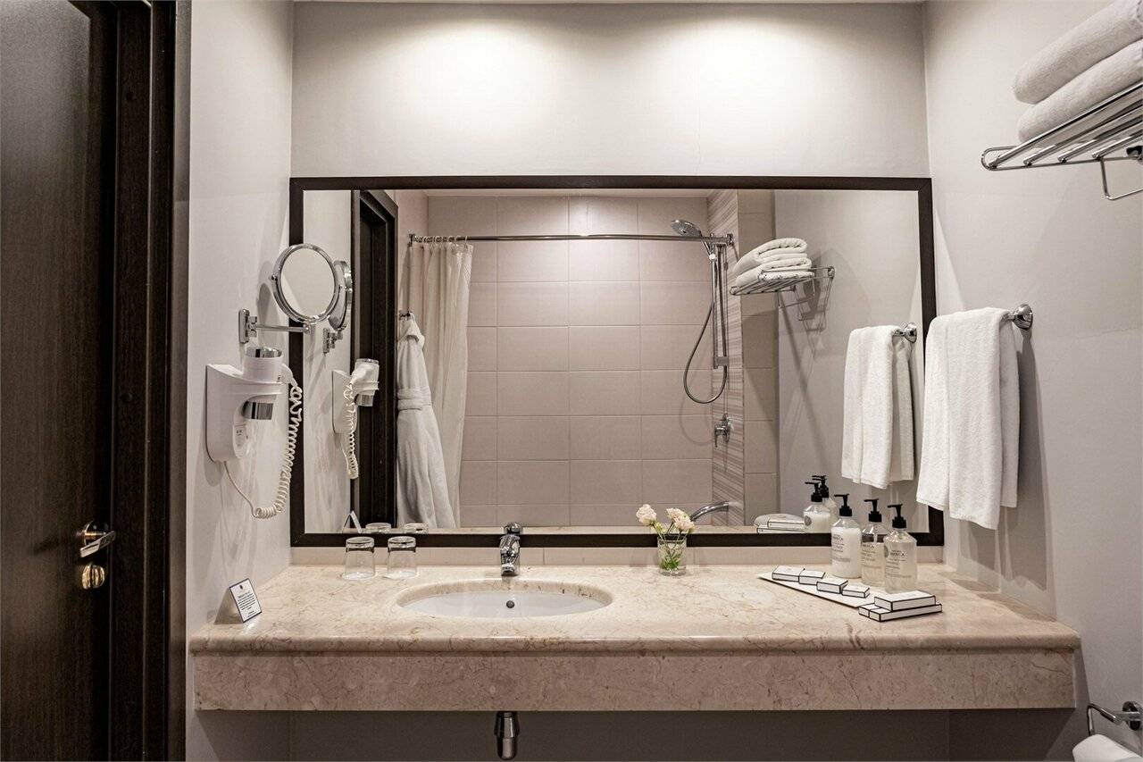 Фотографии номера Представительский номер с одной большой или двумя раздельными кроватями в Гостинице Петро Палас Санкт-Петербург