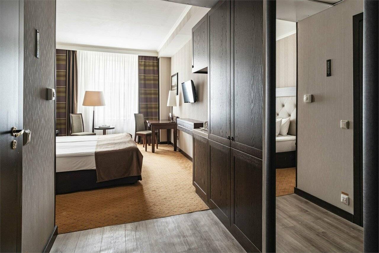 Фотографии номера Улучшенный номер с одной большой или двумя раздельными кроватями в Гостинице Петро Палас Санкт-Петербург