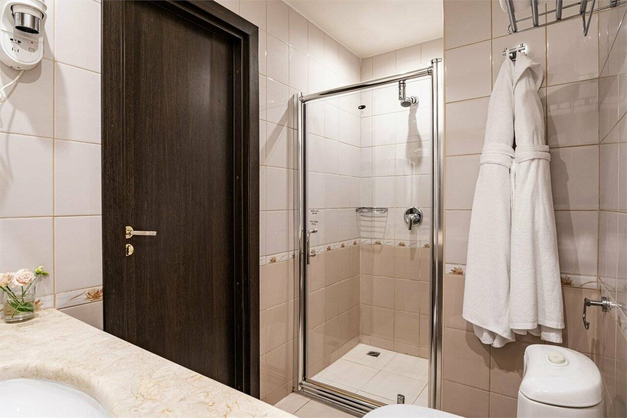 Фотографии номера Улучшенный номер с одной большой или двумя раздельными кроватями в Гостинице Петро Палас Санкт-Петербург