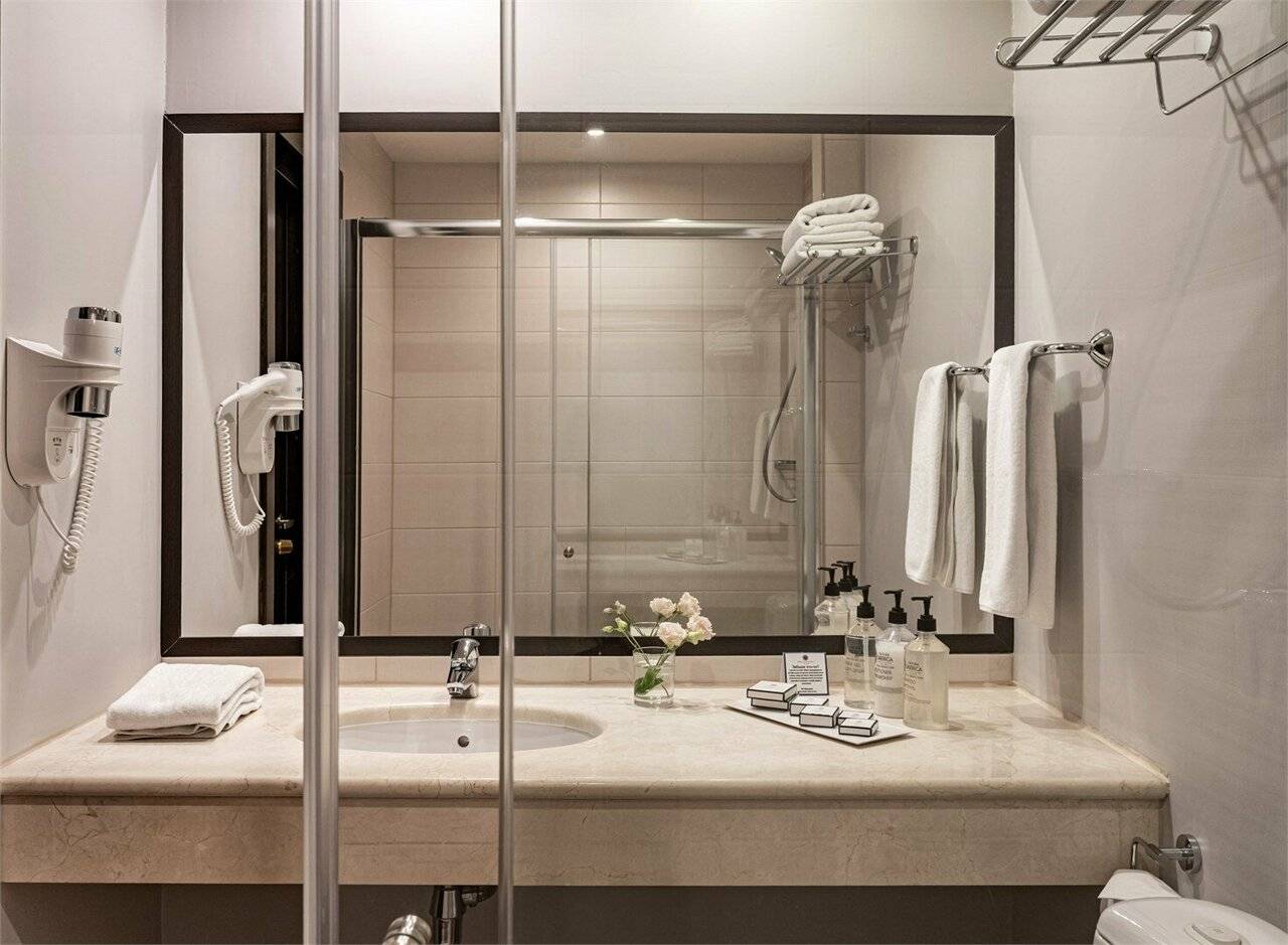 Фотографии номера Улучшенный номер с одной большой или двумя раздельными кроватями в Гостинице Петро Палас Санкт-Петербург