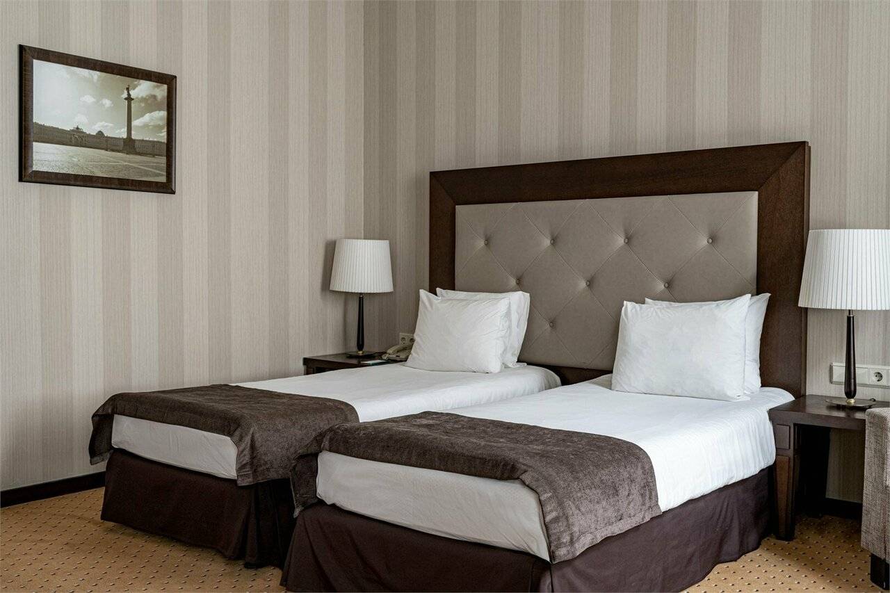 Улучшенный номер с одной большой или двумя раздельными кроватями