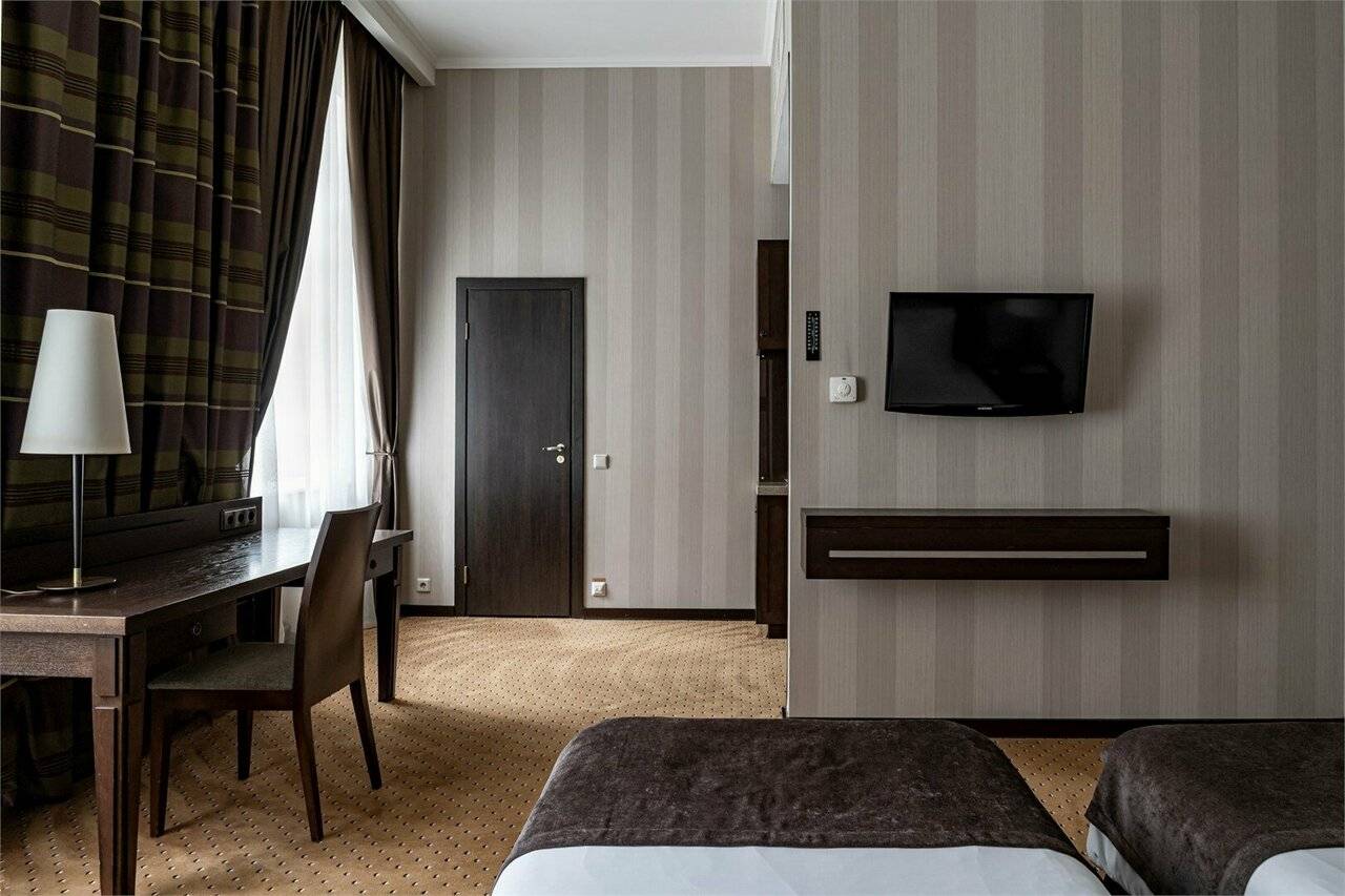 Фотографии номера Улучшенный номер с одной большой или двумя раздельными кроватями в Гостинице Петро Палас Санкт-Петербург